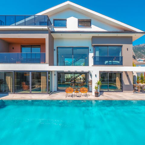 Go for a float in the private outdoor pool and let the sun dry you off on the poolside loungers