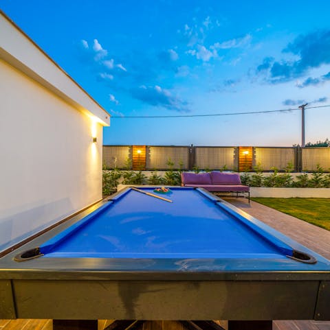 Let your competitive side out with an afternoon game of pool amongst friends