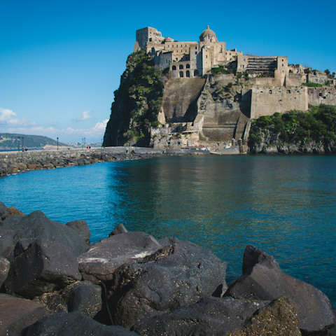 Discover Aragonese Castle, a fifteen-minute drive away