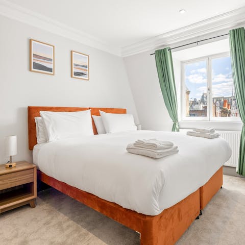 Sprawl out on the bed after a busy day sightseeing