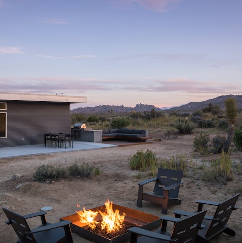 Toast marshmallows over the fire pit
