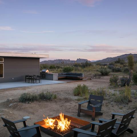 Toast marshmallows over the fire pit