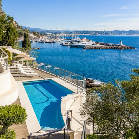 Enjoy swimming with a view at this waterfront home