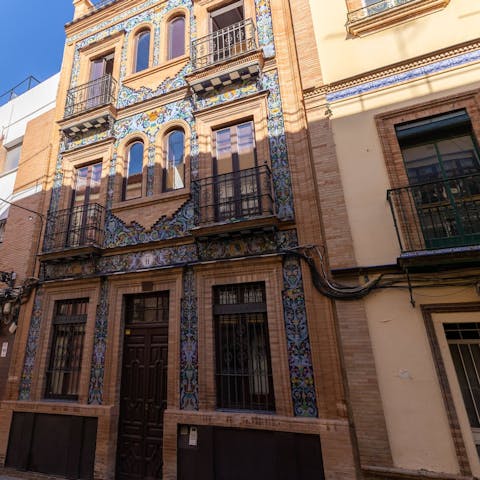 Take some snaps of the building's ceramic facade