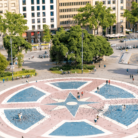 Spend an hour people-watching at Plaça de Catalunya