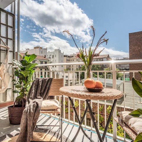 Take a refreshing pause from your city adventures on the balcony