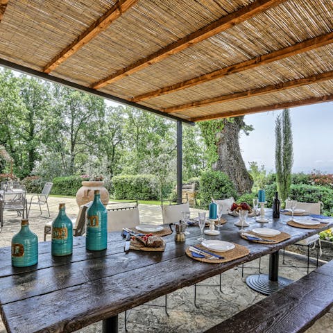 Dine alfresco under the veranda long into the balmy summer evenings