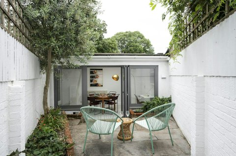 Sip evening drinks outdoors in the secluded courtyard