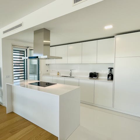 Cook up a feast of Portuguese fayre in this sleek, modern kitchen