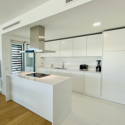 Cook up a feast of Portuguese fayre in this sleek, modern kitchen