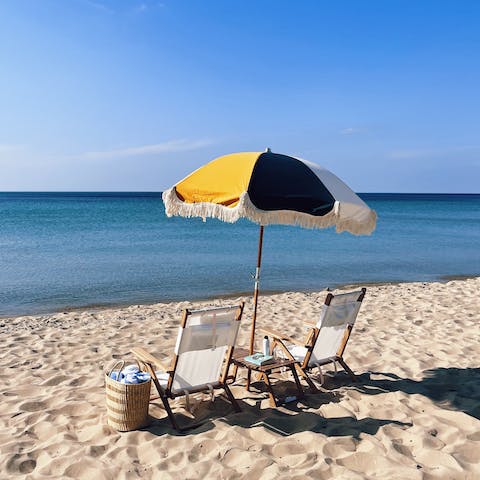 Stay just a ten-minute drive from Good Harbor Bay Beach