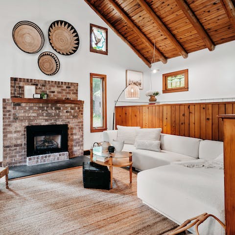 Get snuggly amidst the stylish interiors of the living area