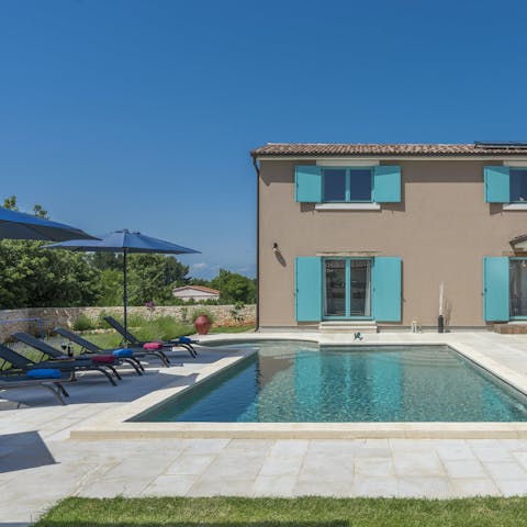 Spend blissful afternoons lounging by the pool