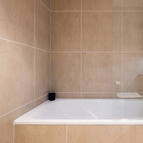 Soak in one of the two bathtubs