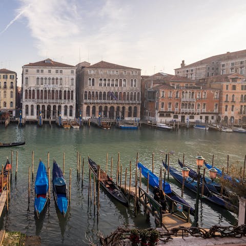 Let yourself lose track of time while taking in the scenery from your canalfront apartment