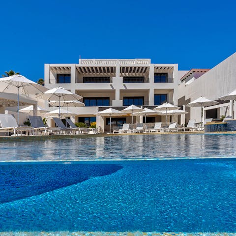 Go for a swim and sunbathe by the large communal pool