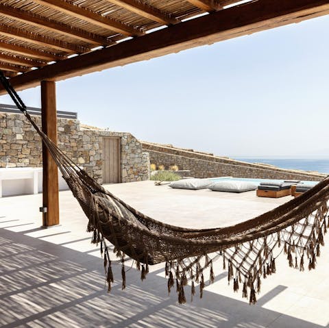Spend lazy days enjoying sea views from the hammock