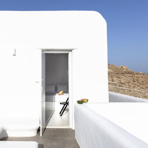 Wake up to the glorious Mykonos sun on the balcony