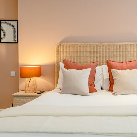 Unwind in the soothing minimalist bedroom before drifting off