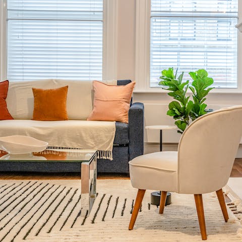 Kick back in the chic living room after a day spent exploring Soho