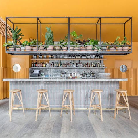 Sip a cocktail and strike up a chat with the neighbours in the onsite bar