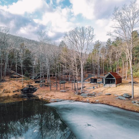 Enjoy the peace and quiet of 19 acres of private land, including a pond