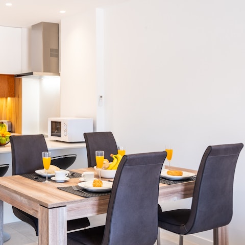 Tuck into delicious pastel de natas and coffee around the dining table