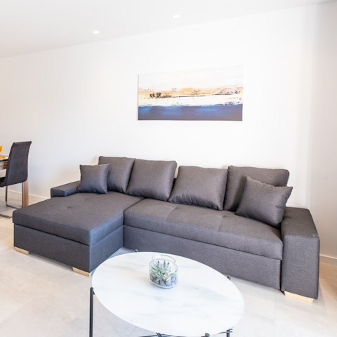 Relax on the comfy sofa after long days exploring Portugal