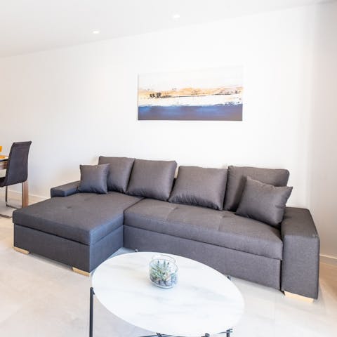 Relax on the comfy sofa after long days exploring Portugal