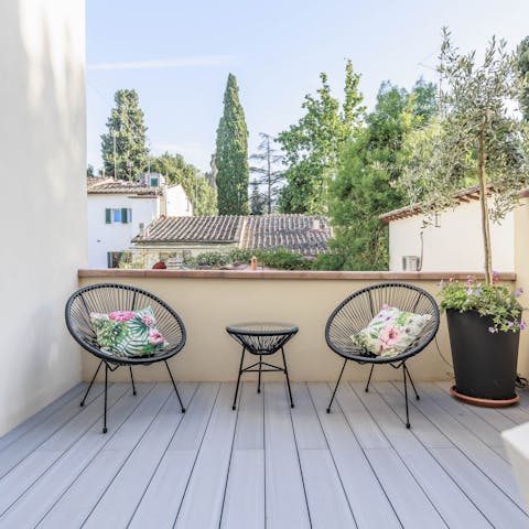 Relax with drinks on the private terrace