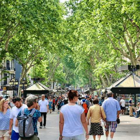 Stroll along Las Ramblas, stopping for tapas along the way