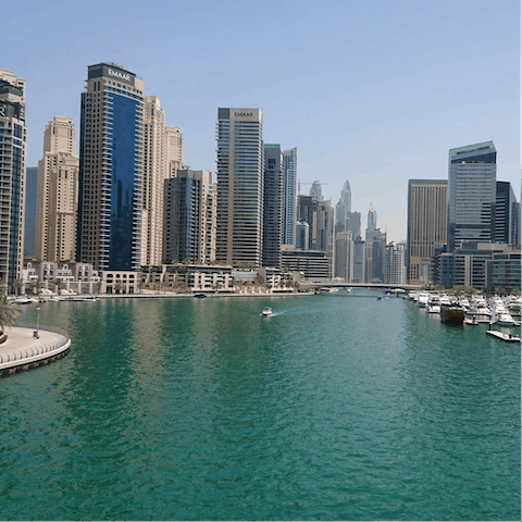 Wander the banks of Dubai Marina, less than twenty minutes away in the car
