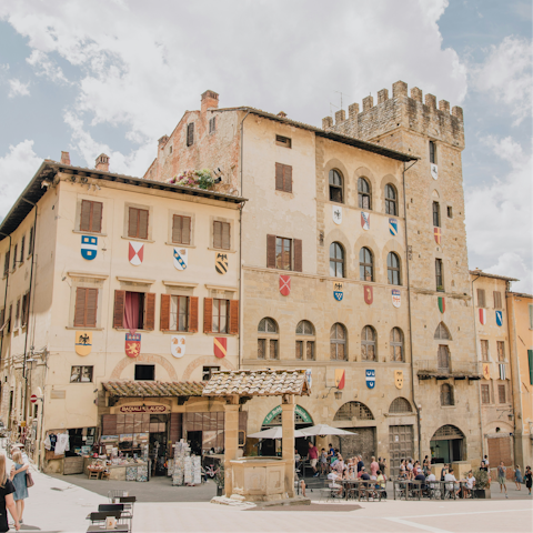 Take a day trip to the historic city of Arezzo, a thirty-minute drive away
