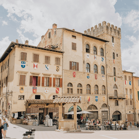 Take a day trip to the historic city of Arezzo, a thirty-minute drive away