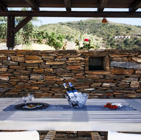 Dine alfresco in one of the home's seating areas