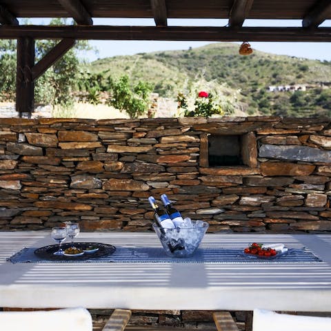 Dine alfresco in one of the home's seating areas