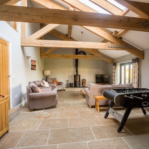 Enjoy the rustic touch, courtesy of flagstone floors and high beamed ceilings