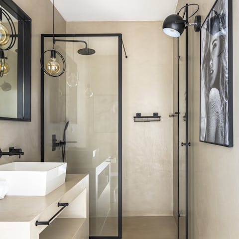 Relax under the rainfall shower after a day of sightseeing