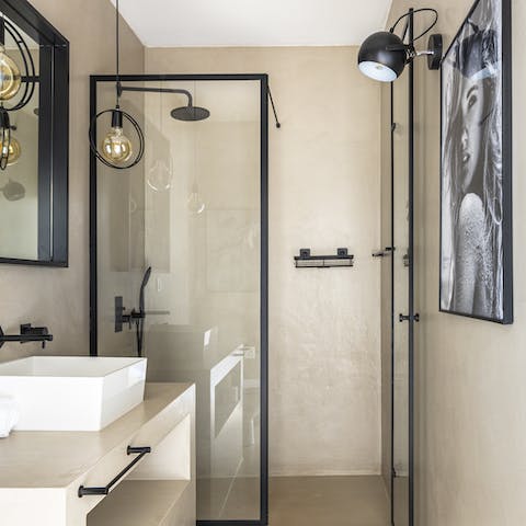 Relax under the rainfall shower after a day of sightseeing