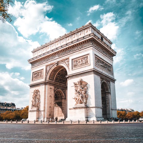 Stroll along the Champs-Élysées to the Arc de Triomphe