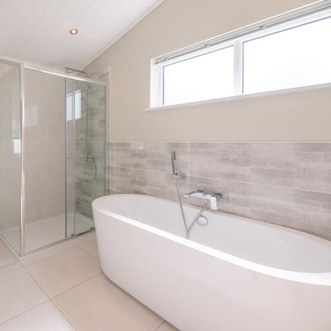 Treat yourself to a romantic soak in the double-ended bathtub