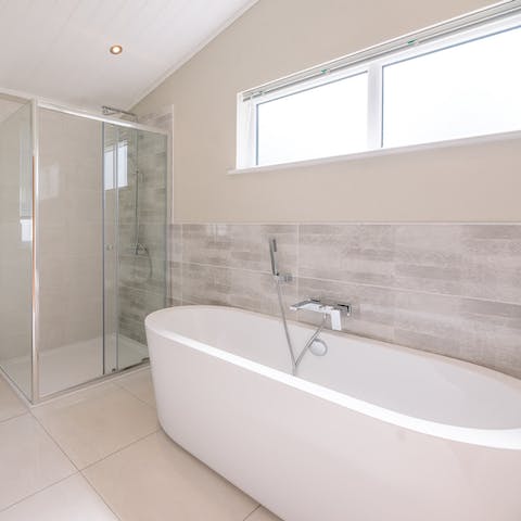 Treat yourself to a romantic soak in the double-ended bathtub