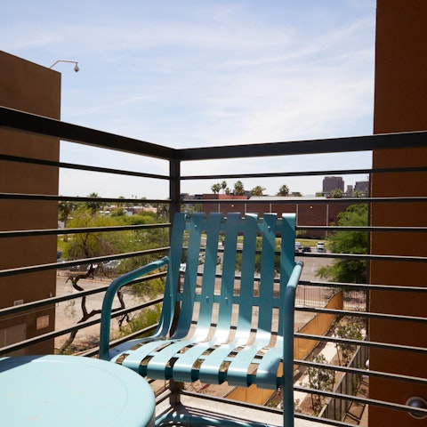 End the evening with a glass of wine on the private balcony, watching the desert sunset