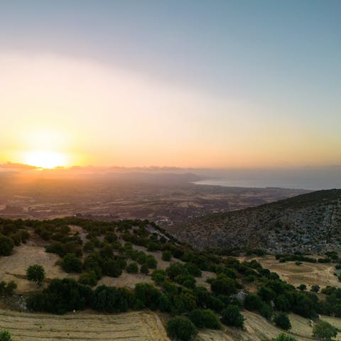 Sip cocktails as you watch the sun sink in the sky