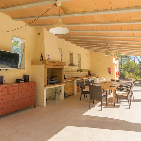 Make the most of the poolside porch featuring a TV, surround sound and kitchen amenities
