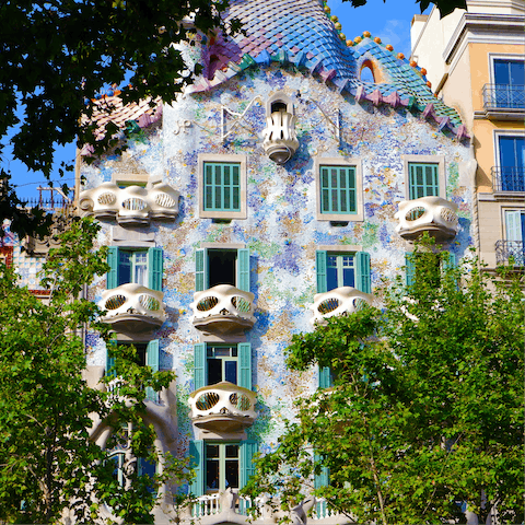 Take a twenty-minute walk to visit the striking architecture of Casa Batlló