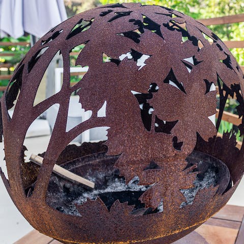 Chat way into the night around the designer fire pit
