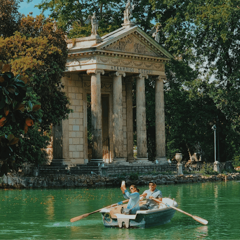 Rent a boat at Villa Borghese gardens, fifteen-minute bus ride away