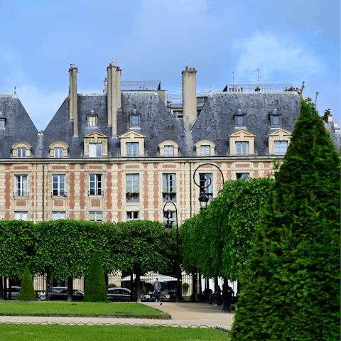 Wander down to Place des Vosges, right across the road