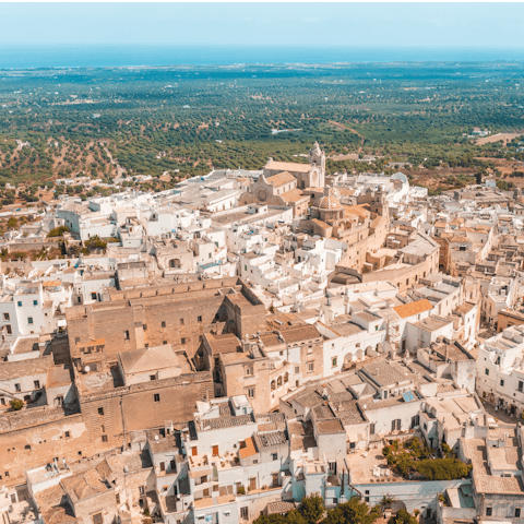 Explore the museums, shops, and restaurants of Brindisi